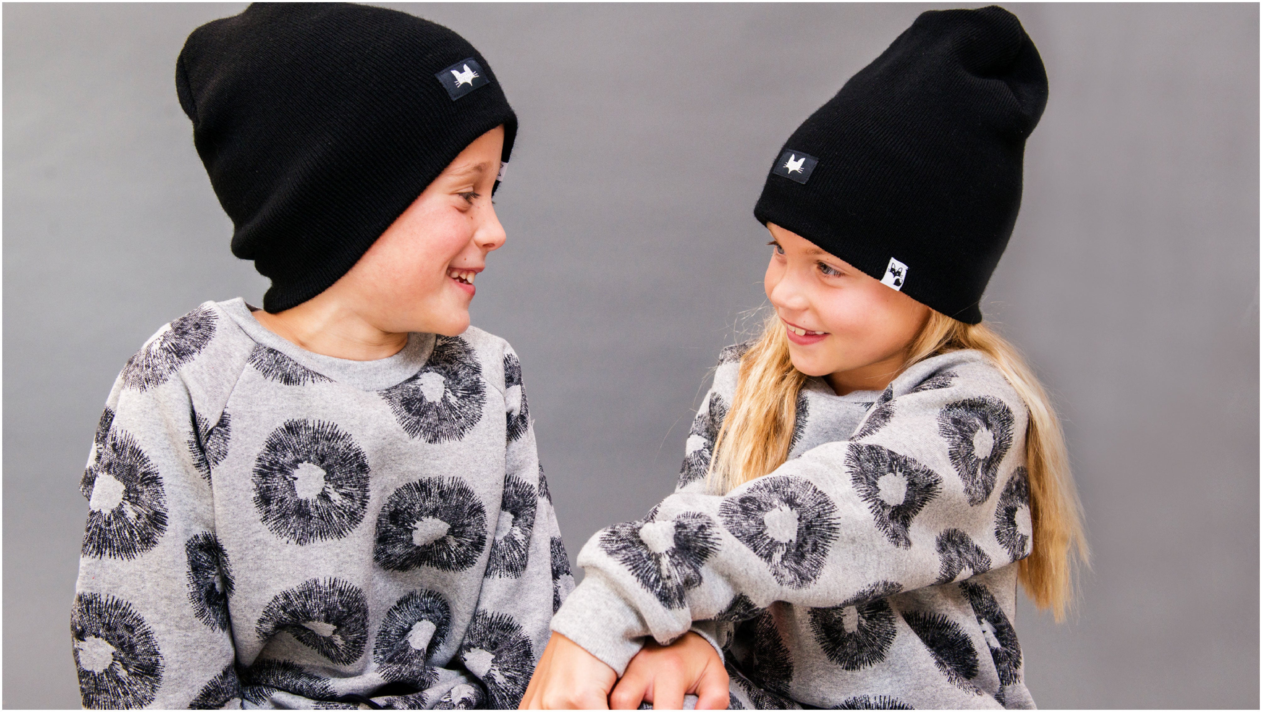 Unisex grey sweatshirt with mushroom print design. Made in the uk.