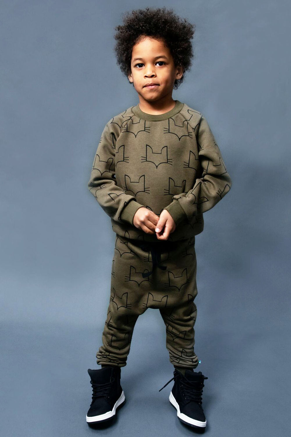 comfy sweat fabric jogger made in britain from a blend of Upcycled cotton and plastic bottle. unisex olive green conscious casual wear