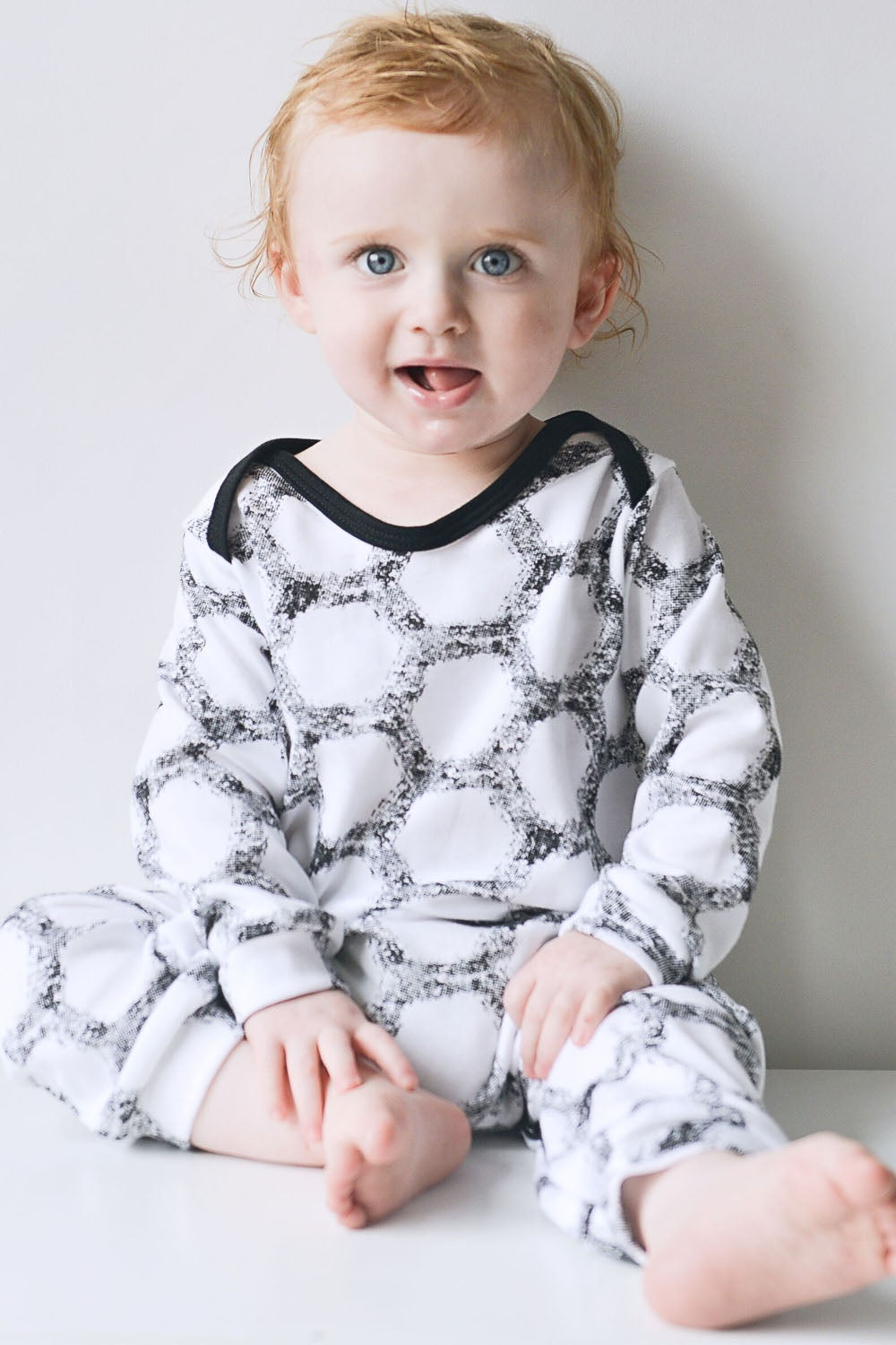 Super soft 100% cotton baby romper, vegan friendly and made in Britain.
