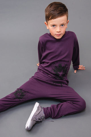 100% cotton jersey joggers with star splat ink design in punch plum, made and designed in Britain