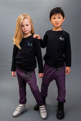 100% cotton, unisex punchy plum Joggers. Made and designed in Britain using chemical free inks.