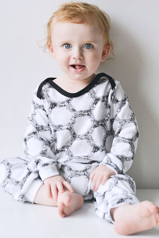 Super soft 100% cotton baby romper, vegan friendly and made in Britain. 
