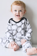 Super soft 100% cotton baby romper, vegan friendly and made in Britain. 